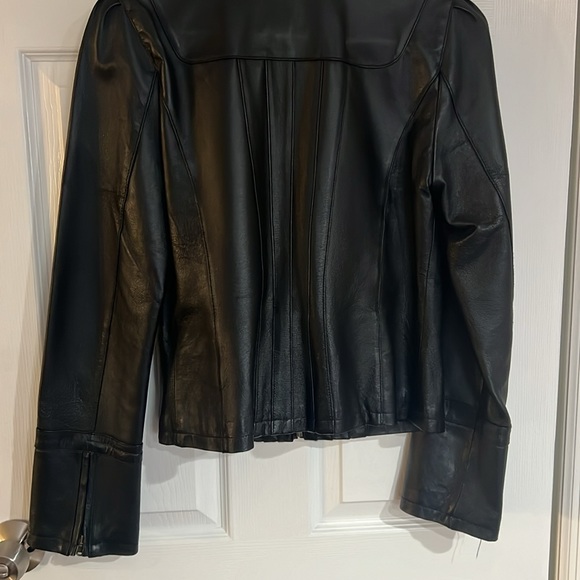Gently used Guess black leather jacket. Size M zippered sleeves - Picture 6 of 9